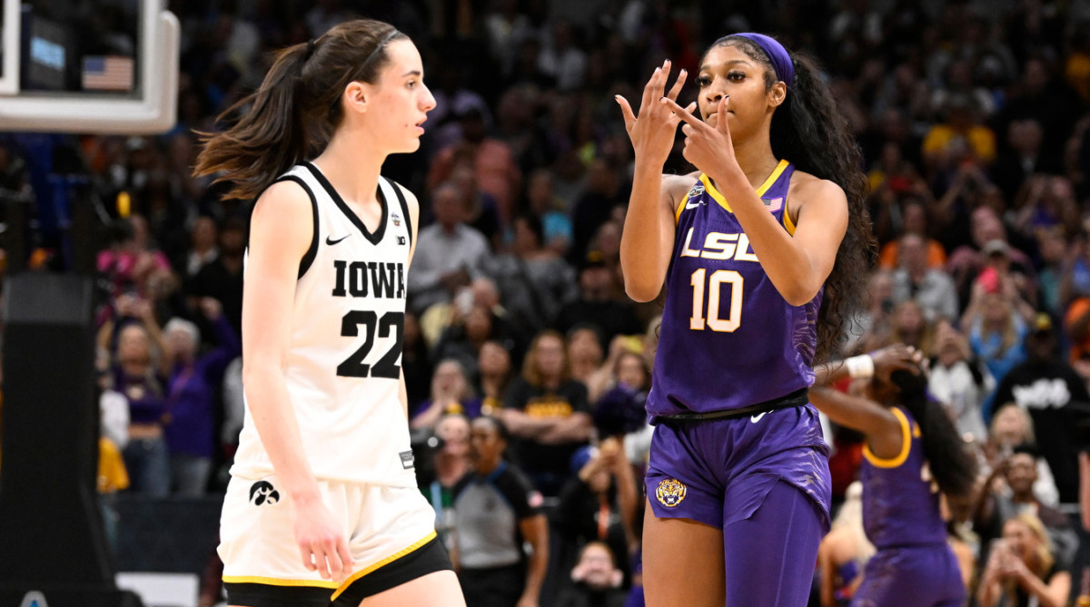 LSU’s Angel Reese points to her finger in front of Iowa’s Caitlin Clark in the NCAA women’s championship game.